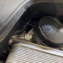 Tire Kingdom - Oil leaking from filter housing