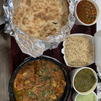 Mehran Restaurant - Naan,karahi chicken for two, Chole , rice , saag aloo , sauce. - Halal Near Me - Arlington, Virginia Mehran Restaurant - Naan,karahi chicken for two, Chole , rice , saag aloo , sauce. - Halal Near Me - Arlington, Virginia