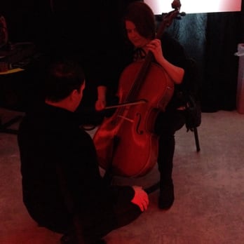 CityCenter at 735 - Trying to play the cello - Commercial Real Estate Near Me - Milwaukee, Wisconsin