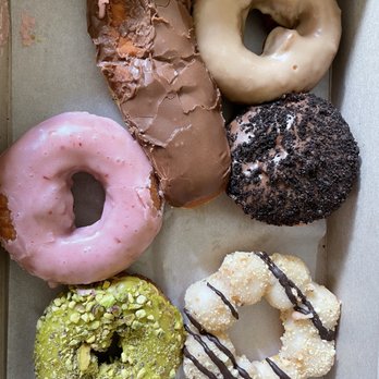 Friendly Donuts - Half dozen.  Vegan Pistachio Cake, Vegan Chocolate Bar, Vegan Maple cake donut, Vegan Boston Creme, vegan strawberry donut/.. - Donuts Near Me - Orange, California
