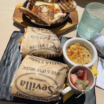 Cafe Sevilla - Queso Fundido and chorizo breakfast burrito - Spanish Near Me - Costa Mesa, California Cafe Sevilla - Queso Fundido and chorizo breakfast burrito - Spanish Near Me - Costa Mesa, California