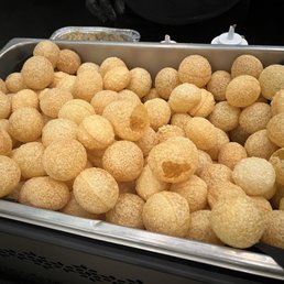 Sp  Pani Puri balls with delicious filling and moderately spicy sauce