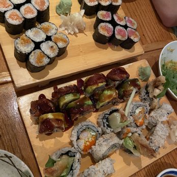 Marumi - The spread (get the top tray with sashimi rolls!!) - Sushi Bars Near Me - New York, New York