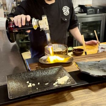 Asahi Sushi & Kitchen - The owner preparing another masterpiece for us. - Sushi Bars Near Me - Healdsburg, California Asahi Sushi & Kitchen - The owner preparing another masterpiece for us. - Sushi Bars Near Me - Healdsburg, California