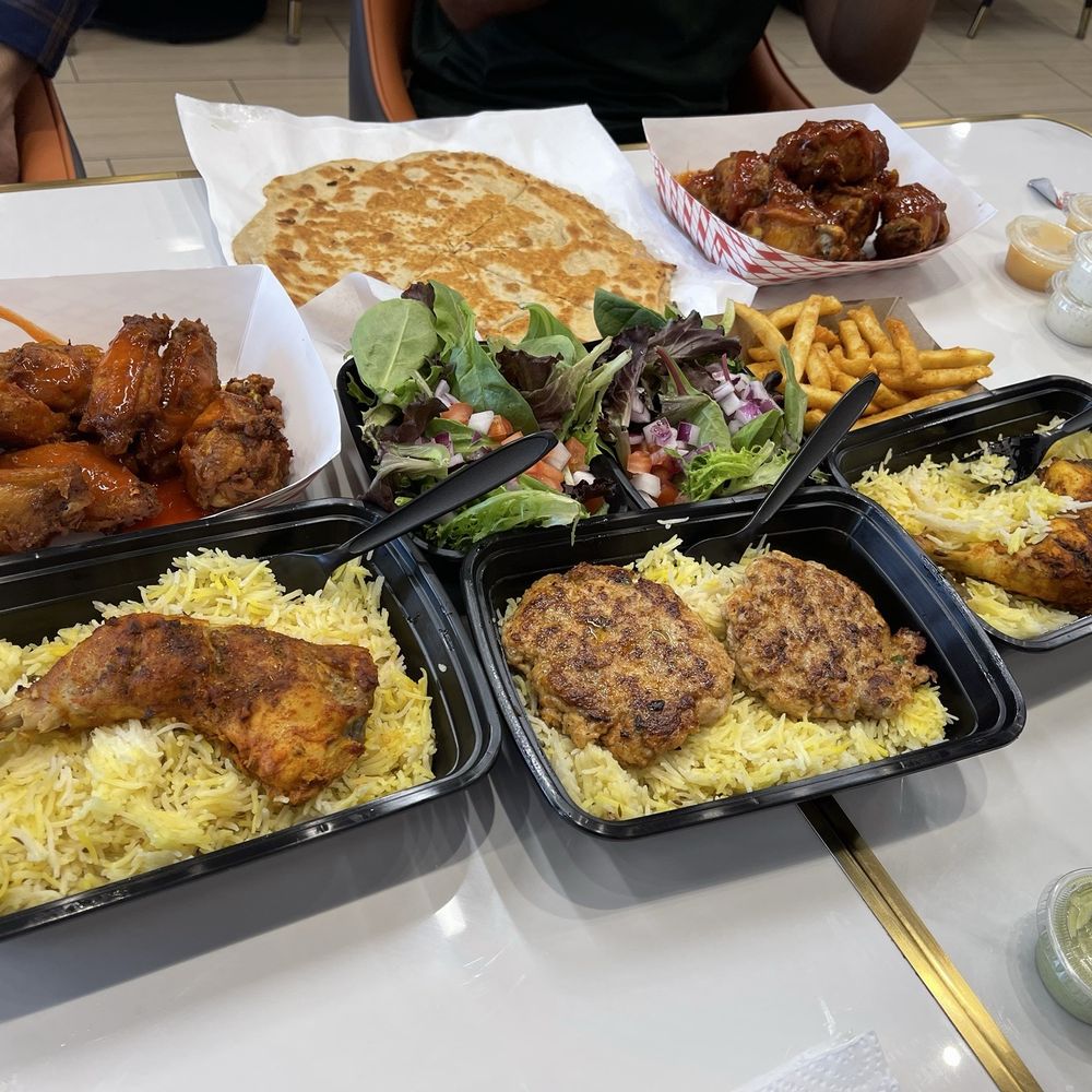 buffalo and chili garlic wings, 2 orders of masala fries, 1 chicken paratha, 2 grilled chicken 1 chicken kabob platter. buffalo and chili garlic wings, 2 orders of masala fries, 1 chicken paratha, 2 grilled chicken 1 chicken kabob platter.