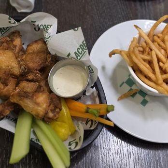 Five Acres - Chicken Wings (seasoned) and Fries. Check out the baby carrots. - Cocktail Bars Near Me - New York, New York Five Acres - Chicken Wings (seasoned) and Fries. Check out the baby carrots. - Cocktail Bars Near Me - New York, New York