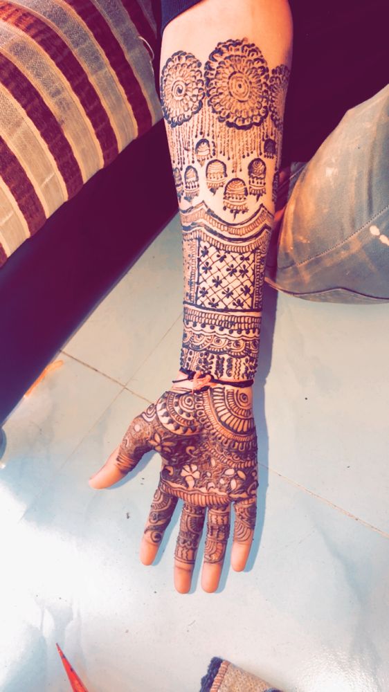 Henna Tattoo Logo