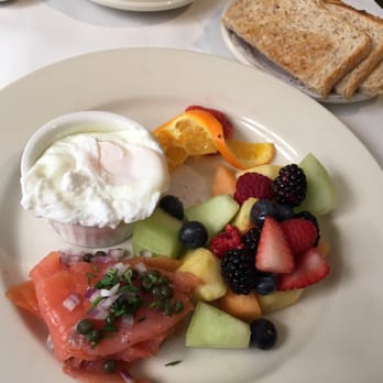 Hemmingway's Bistro - Poached eggs salmon and fruit AND toast! - Breakfast & Brunch Near Me - Oak Park, Illinois Hemmingway's Bistro - Poached eggs salmon and fruit AND toast! - Breakfast & Brunch Near Me - Oak Park, Illinois