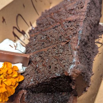 Fairview Farmers - My enormous $15 piece of Tall Chocolate Cake to go - Breakfast & Brunch Near Me - Fairview, Texas Fairview Farmers - My enormous $15 piece of Tall Chocolate Cake to go - Breakfast & Brunch Near Me - Fairview, Texas