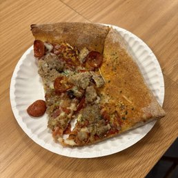 $9.89 slice of pizza (cut in half)