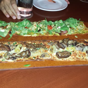 Seasons 52 - Flat bread garlic chicken and the meat one - New American Near Me - Costa Mesa, California Seasons 52 - Flat bread garlic chicken and the meat one - New American Near Me - Costa Mesa, California