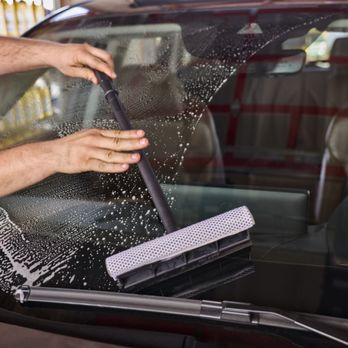 Take 5 Oil Change - Windshield being cleaned during oil change. - Oil Change Stations Near Me - Euclid, Ohio Take 5 Oil Change - Windshield being cleaned during oil change. - Oil Change Stations Near Me - Euclid, Ohio