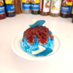 Ice Cream Crush - Shark Attach Shave Ice. blue raspberry, strawberry drizzle, gummy sharks.
