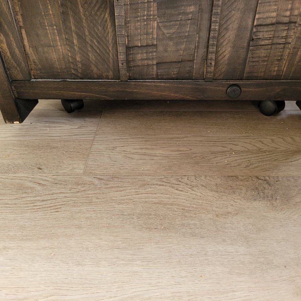 Bottom of coffee table has damage on the sides. See the chipping wood that's lighter than the surface of the table. Bottom of coffee table has damage on the sides. See the chipping wood that's lighter than the surface of the table.