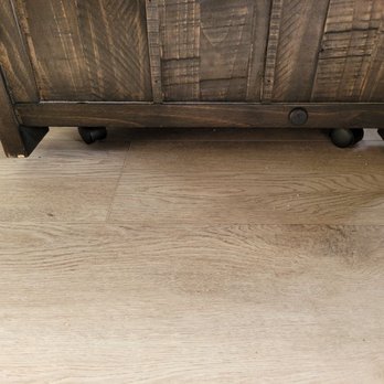 Ace Moving - Bottom of coffee table has damage on the sides. See the chipping wood that's lighter than the surface of the table. - Movers Near Me - Oakland, California