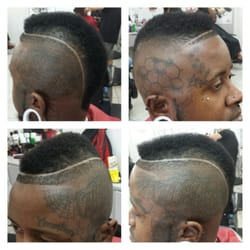 Mohawk skin fade with a hard part edge by Izzy