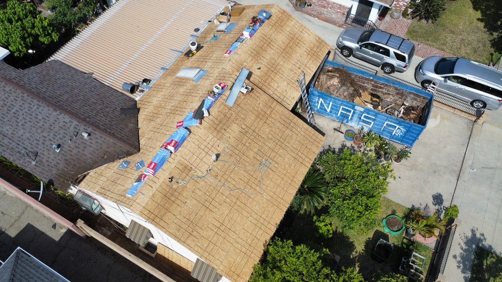 Slide of Ruiz Roofing