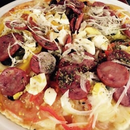 Portuguese pizza - tomatoes, onions, sausage, boiled eggs, jalapeños. Needed to be crispier! Portuguese pizza - tomatoes, onions, sausage, boiled eggs, jalapeños. Needed to be crispier!