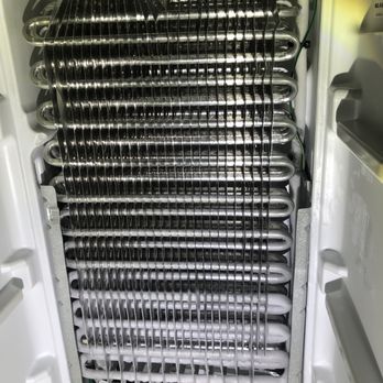 Constantine Appliance Repair - Checking for signs of frost buildup on an evaporator! - Appliances & Repair Near Me Constantine Appliance Repair - Checking for signs of frost buildup on an evaporator! - Appliances & Repair Near Me