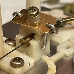 Stereoadvisor - This is eject button support was literally fix with bailing wire.