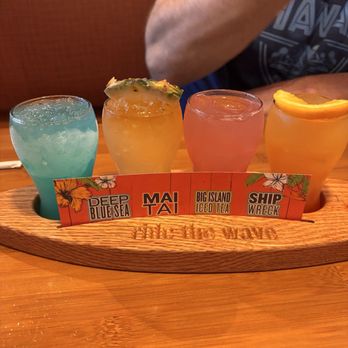 Islands Restaurant - Ride the wave - tropical cocktail flight - Burgers Near Me - Fountain Valley, California Islands Restaurant - Ride the wave - tropical cocktail flight - Burgers Near Me - Fountain Valley, California