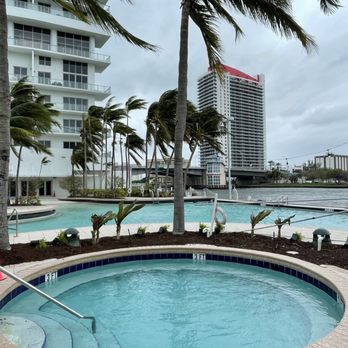 Crespo’s Complete Maintenance - an outdoor pool with palm trees - Landscaping Near Me Crespo’s Complete Maintenance - an outdoor pool with palm trees - Landscaping Near Me