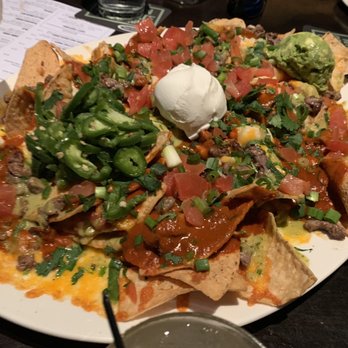 Yard House - Steak and chicken nachos are not on the happy hour menu but a must - Bars Near Me - Glendale, Arizona Yard House - Steak and chicken nachos are not on the happy hour menu but a must - Bars Near Me - Glendale, Arizona