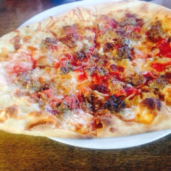Oak Oven - Maiale pizza-roast pork, fennel sausage, smoked bacon and sweet onion - Pizza Near Me - Harahan, Louisiana Oak Oven - Maiale pizza-roast pork, fennel sausage, smoked bacon and sweet onion - Pizza Near Me - Harahan, Louisiana