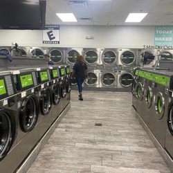 DJ's Laundromart - This is the rude woman who wouldn't apply my minutes I paid for brushing me off,
