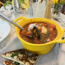 Seasonal Fish Pot with garlic cheese toast