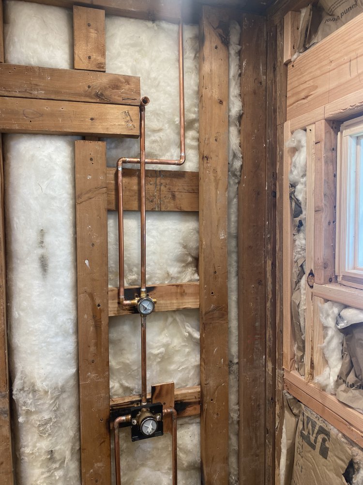 Slide of The in and out plumbing guy