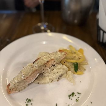 Monocacy Crossing - Half portion of shared entree- salmon with mashed potatoes and zucchini - New American Near Me - Frederick, Maryland Monocacy Crossing - Half portion of shared entree- salmon with mashed potatoes and zucchini - New American Near Me - Frederick, Maryland