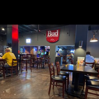Railhouse Pub - a man sitting at a table - Bars Near Me - Wright City, Missouri