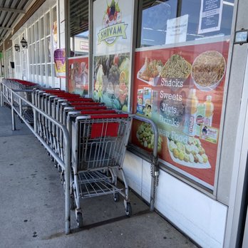 Shivam Grocery - a row of shopping carts in front of a store - International Grocery Near Me - Marietta, Georgia Shivam Grocery - a row of shopping carts in front of a store - International Grocery Near Me - Marietta, Georgia