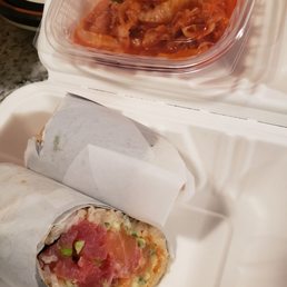 Kimchi and byo burrito with spicy tuna and salmon Kimchi and byo burrito with spicy tuna and salmon