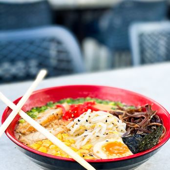 Lifting Noodles - a bowl of ramen with chopsticks - Ramen Near Me - Duluth, Georgia