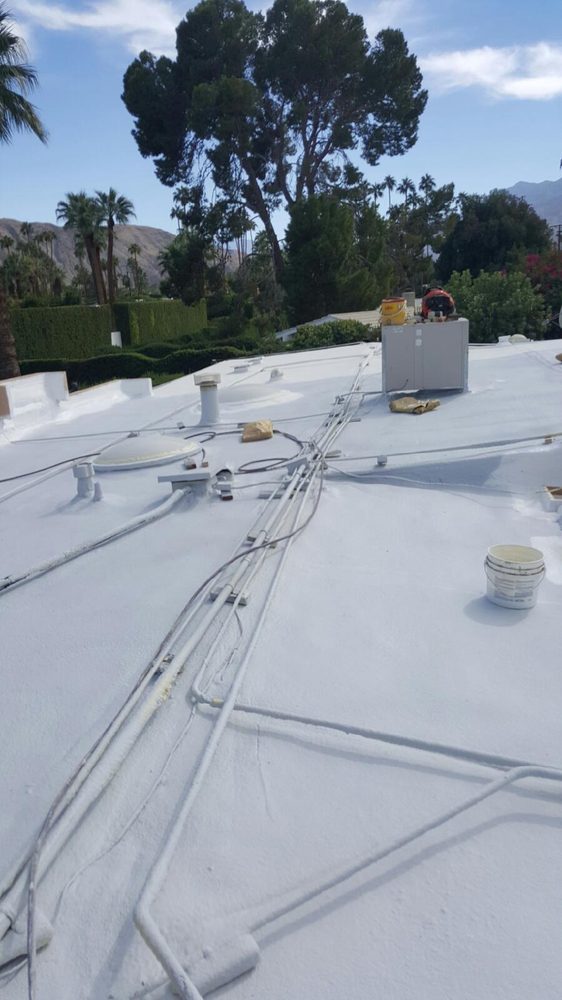 Slide of Foam Bond-A Quality Roofing