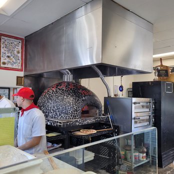 786 Degrees - a man working in a restaurant kitchen - Pizza Near Me - Los Angeles, California