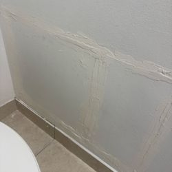 Courtside Villas - Patched over walls