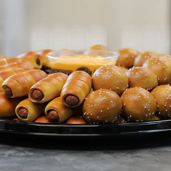 Philly Pretzel Factory - a platter of hot dogs wrapped in cheese - Bakeries Near Me - Philadelphia, Pennsylvania Philly Pretzel Factory - a platter of hot dogs wrapped in cheese - Bakeries Near Me - Philadelphia, Pennsylvania