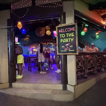 Mr. Flamingo - Photo 9: Entrance in the evening - Gay Bars Near Me - Puerto Vallarta, JAL
