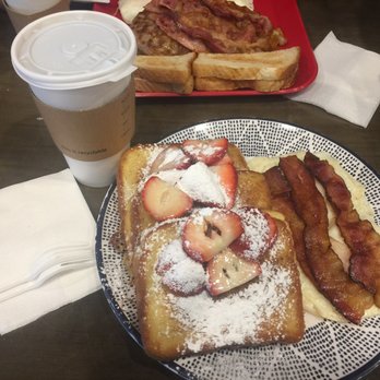 Java Day Cafe - I had blueberry cream cheese stuffed French toast with strawberries on top with bacon and eggs on the side. - Coffee & Tea Near Me - Flushing, New York