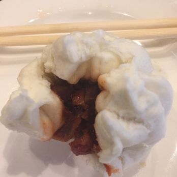 Real Wok - Steamed BBQ park Bun showing inside filling.... - Dim Sum Near Me - Lake Worth, Florida Real Wok - Steamed BBQ park Bun showing inside filling.... - Dim Sum Near Me - Lake Worth, Florida