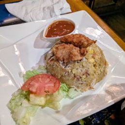 mofongo with boneless fried chicken chunks