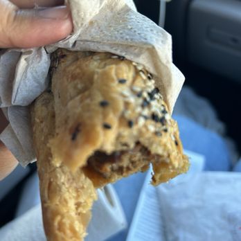 Bula Pies Fiji - Lamb Sausage Roll with sesame seeds on top of crust. - Comfort Food Near Me - Vallejo, California