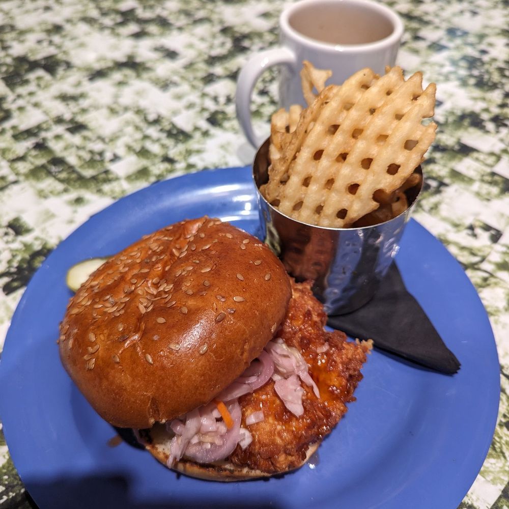 The Friendly Toast - That garlic dill pickle only slightly visible behind the chicken sandwich was one of the best I've had in a long time. - Breakfast & Brunch Near Me - Chestnut Hill, Massachusetts The Friendly Toast - That garlic dill pickle only slightly visible behind the chicken sandwich was one of the best I've had in a long time. - Breakfast & Brunch Near Me - Chestnut Hill, Massachusetts
