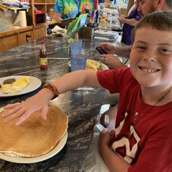 Hungry Hunter Restaurant - Bigger than the plate buttermilk pancake! Yummy! - Breakfast & Brunch Near Me - Branson, Missouri