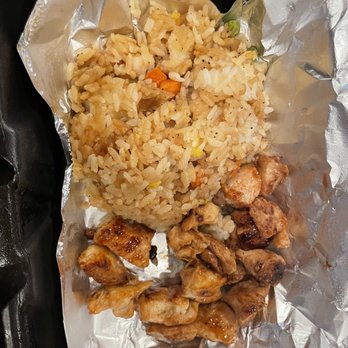 Rock N Roll Sushi - Lunch size chicken hibachi (missing veggies- as u can see, a lot of the rice is still white) - Sushi Bars Near Me - Dothan, Alabama
