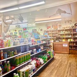 Corbett Country Market - Basic household stuff , liquor in background