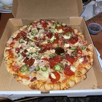 Cosmo’s Pizza - 14 in half maverick half feta, sun dried tomato, jalapeño, red onion, garlic, basil. - Pizza Near Me - Denver, Colorado